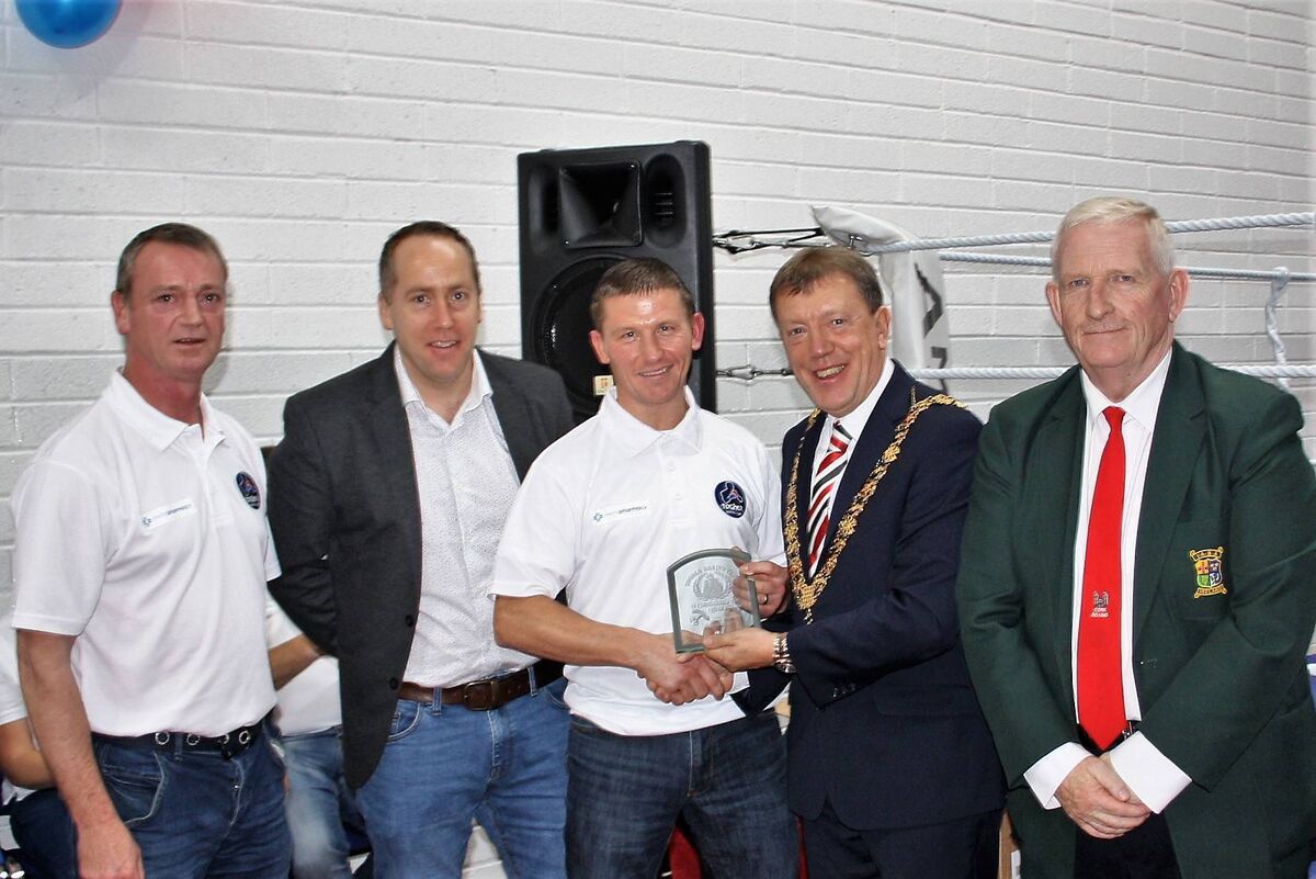 Presentation to club coach Andrew Thornton from lord mayor cllr. Tony Fitzgerald, included are Fergal Dennehy Togher Boxing Club secretary, club president Alan Craughwell, Mick O Brien president Cork County Boxing Board