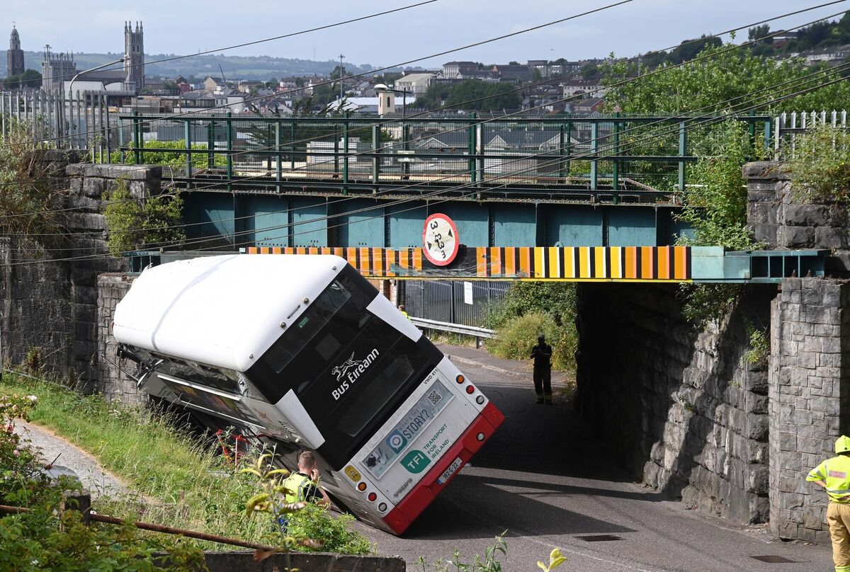 A Bus Éireann bus after colliding with the crash rail at a railway bridge at Dublin Hill, Cork. Picture Denis Minihane.