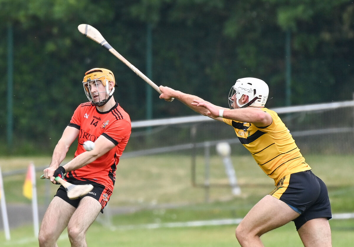 Duhallow's Tomas Howard shoots for goal under pressure from Carrigdhoun's William Hurley. Picture: David Keane. Duhallow's Tomas Howard shoots for goal under pressure from Carrigdhoun's William Hurley. Picture: David Keane.
