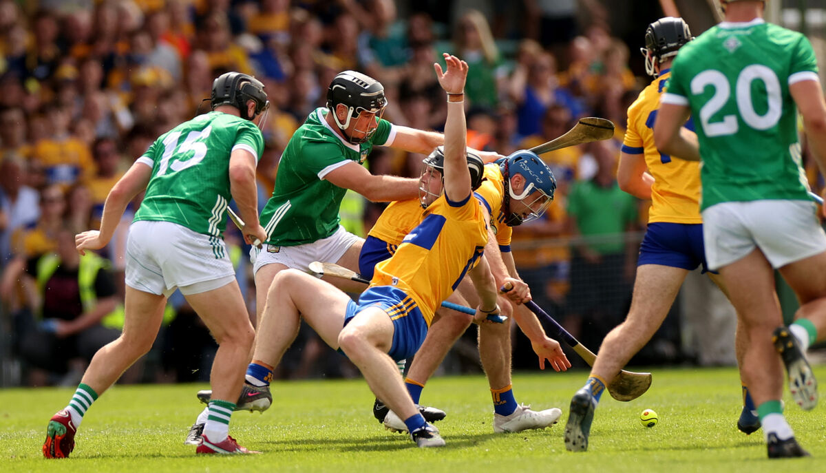 Limerick’s Peter Casey collides with Tony Kelly of Clare during the last play of the Munster hurling final. Picture: INPHO/James Crombie