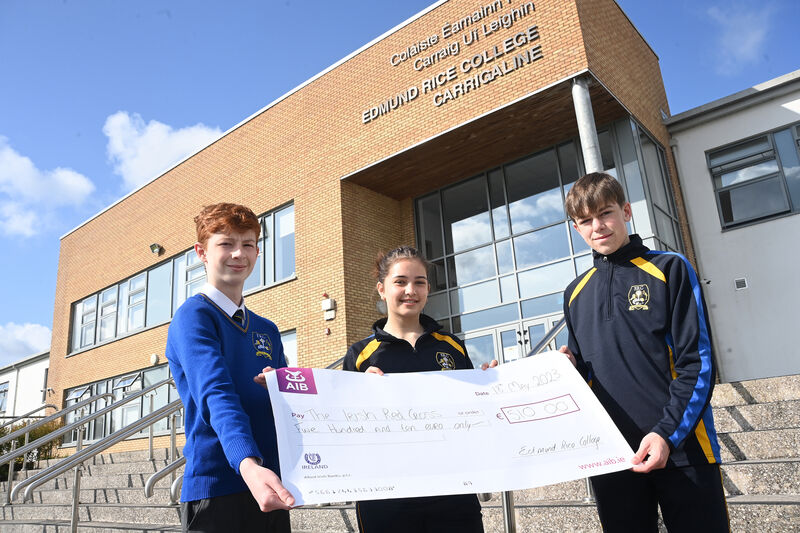 Aaron O’Connell, Anastasia Negru and Liam Davis with the big cheque.Pic Larry Cummins 