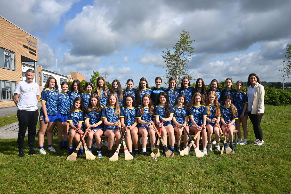 The Under 16.5 years team from Edmund Rice College, Carrigaline who are B County Champions after they beat Carrigaline Community School in the Cork schools camogie final recently, pictured with teachers Jason Barrett and Christine O'Neill. Pic Larry Cummins