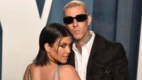 Kourtney Kardashian reveals she's pregnant to Travis Barker at Blink-182 concert