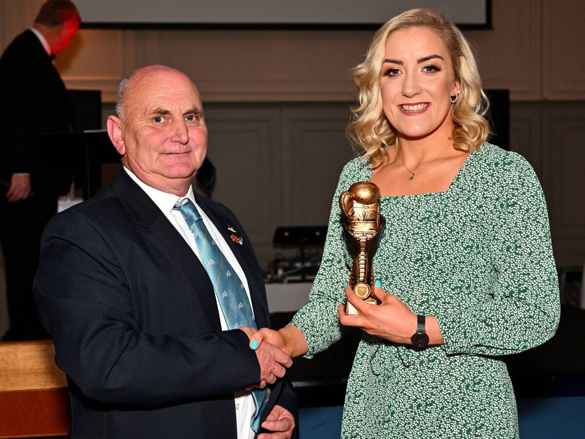 Former Youth Olympian, multiple Irish title winner and European Bronze medalist Christina Desmond receiving a Golden Glove award from Paddy McSweeney of the CEBA. Picture: Doug Minihane