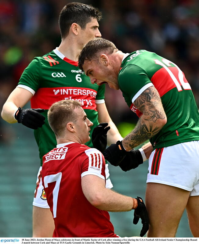 Jordan Flynn of Mayo celebrates in front of Mattie Taylor of Cork after winning a free during the GAA Football All-Ireland Senior Championship Round 3 match between Cork and Mayo at TUS Gaelic Grounds in Limerick. Photo by Eóin Noonan/Sportsfile Jordan Flynn of Mayo celebrates in front of Mattie Taylor of Cork after winning a free during the GAA Football All-Ireland Senior Championship Round 3 match between Cork and Mayo at TUS Gaelic Grounds in Limerick. Photo by Eóin Noonan/Sportsfile