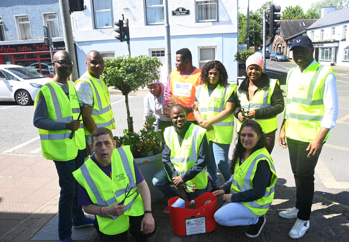 Volunteers together for a photo before heading out filling plant pots on Saturday afternoon. Pic: Larry Cummins