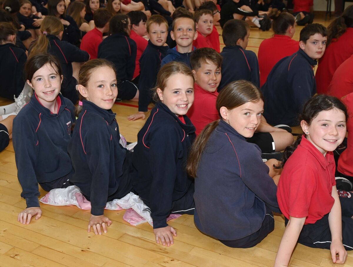 Pupils at the raising of the seventh Green Schools Flag and the Pieta Amber Flag ceremony at Scoil Eoin, Innishannon.