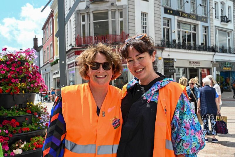 Principal Maura O'Riordan and teacher Elizabeth Kenny pictured in Patrick's Street during Educate Together NS's exciting Flashmob in aid of My Canine Companion. Photo Credit: Chani Anderson
