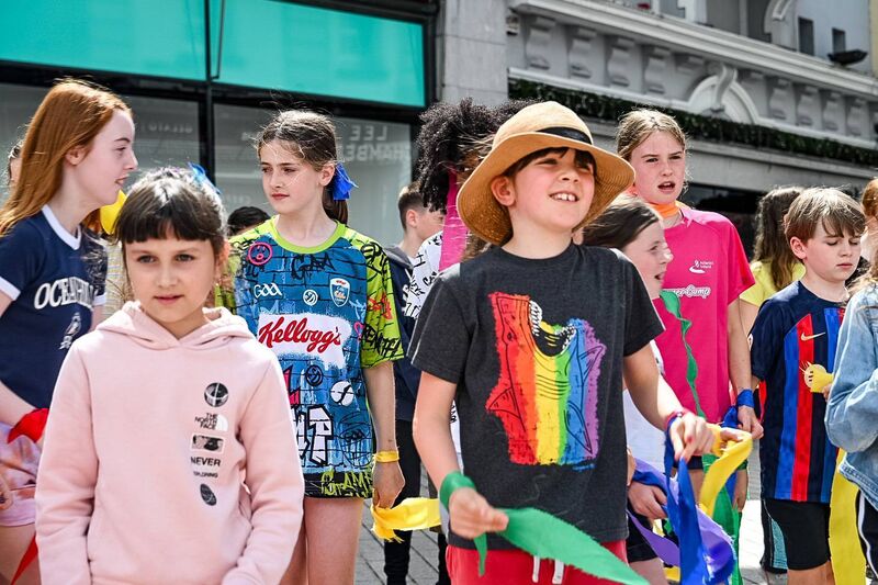 Sophia Rybalka, Ruby O'Sullivan, Freya Flanaghan &amp; fellow classmates of Educate Together NS pictured during their energetic flashmob on Patrick's Street in aid of My Canine Companion. Photo Credit: Chani Anderson