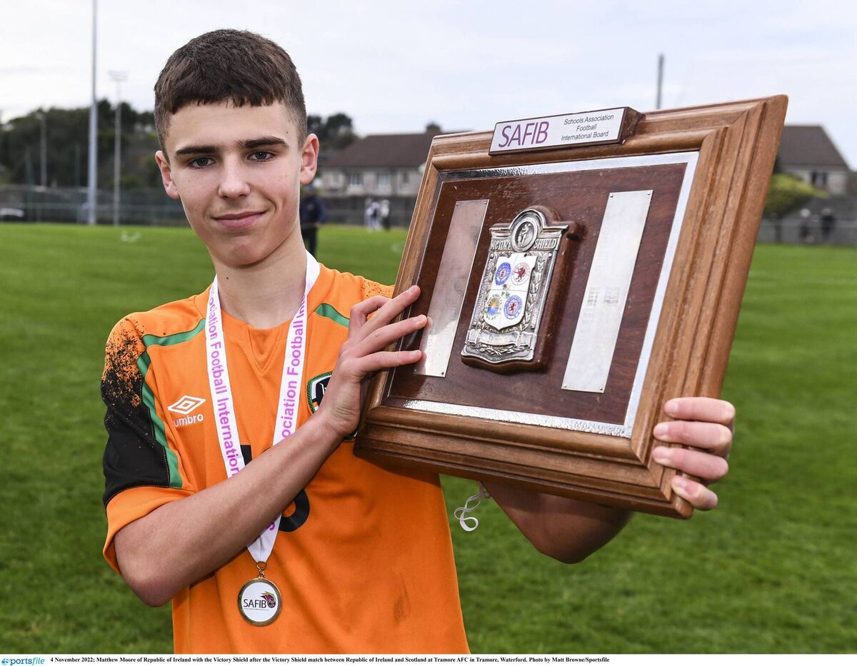 Matthew Moore of Republic of Ireland with the Victory Shield after the Victory Shield match between Republic of Ireland and Scotland at Tramore AFC in Tramore, Waterford. Photo by Matt Browne/Sportsfile Matthew Moore of Republic of Ireland with the Victory Shield after the Victory Shield match between Republic of Ireland and Scotland at Tramore AFC in Tramore, Waterford. Photo by Matt Browne/Sportsfile