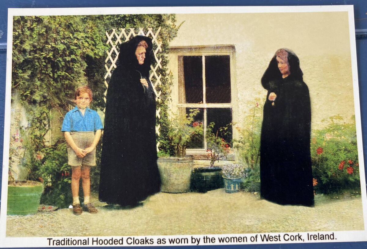 Delia Power’s brother Finbarr and her mother in a hooded cloak, along with a woman who lived at the cottage here in Ballylicky, Bantry Delia Power’s brother Finbarr and her mother in a hooded cloak, along with a woman who lived at the cottage here in Ballylicky, Bantry
