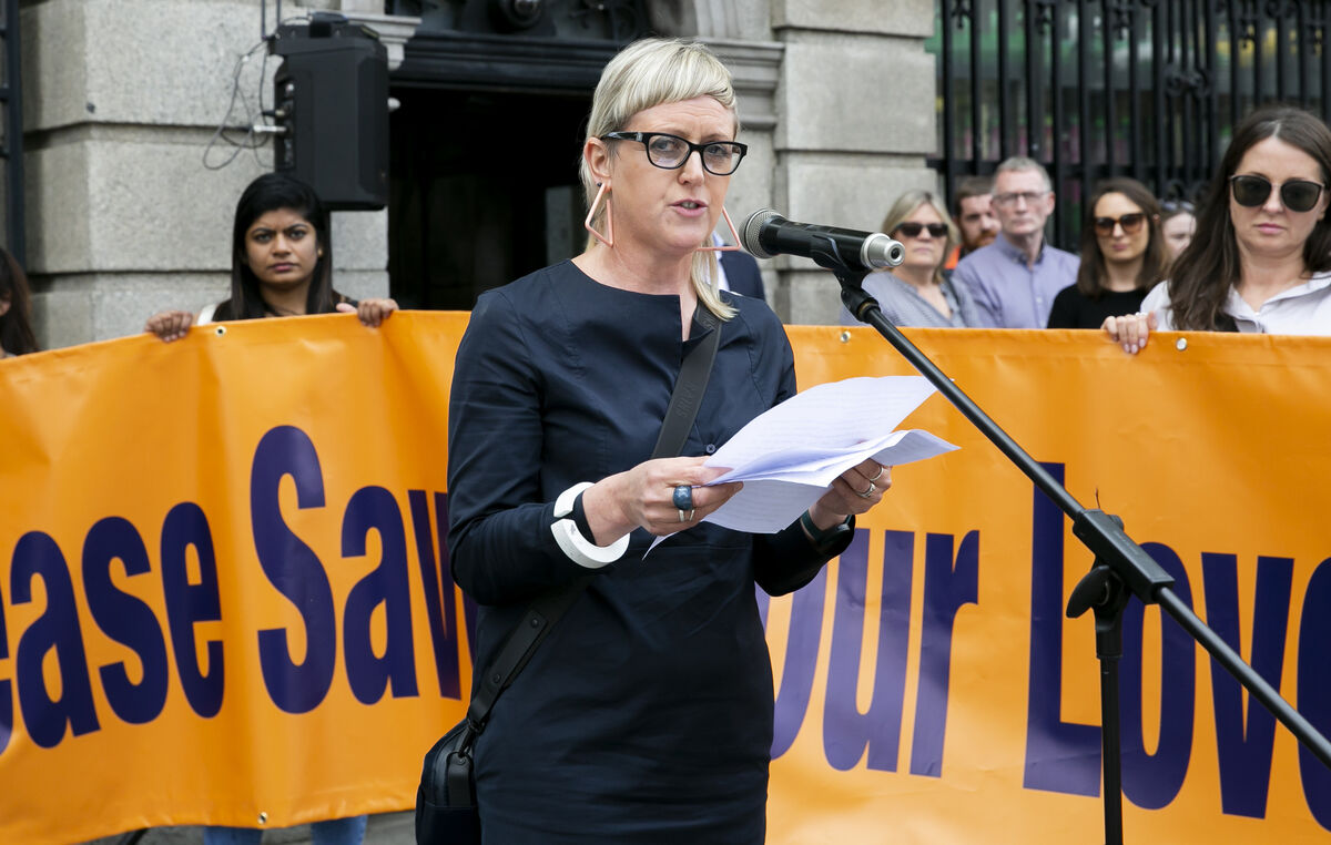 Anne Rogers speaks to the crowd of protesters. Anne Rogers speaks to the crowd of protesters.