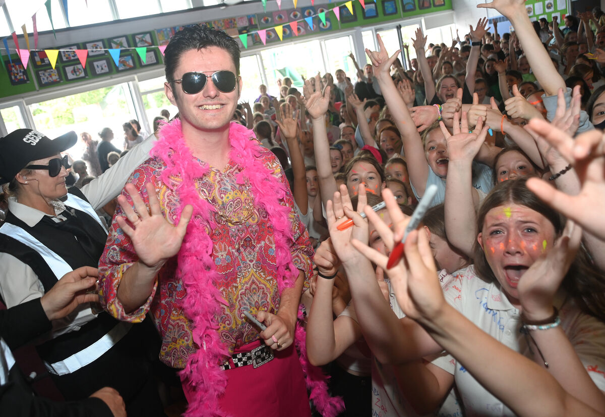  The was a very special live performance by Harry Styles (impersonator Aaron Kelly) at Scoil Bhride, EgLantine Girls NS on Friday afternoon 23rd June 2023. Second class teacher Ms Niamh Maxwell joined Harry on stage to the delight of pupils and staff. Pic Larry Cummins - Echo story by Donal O'Keeffe.
