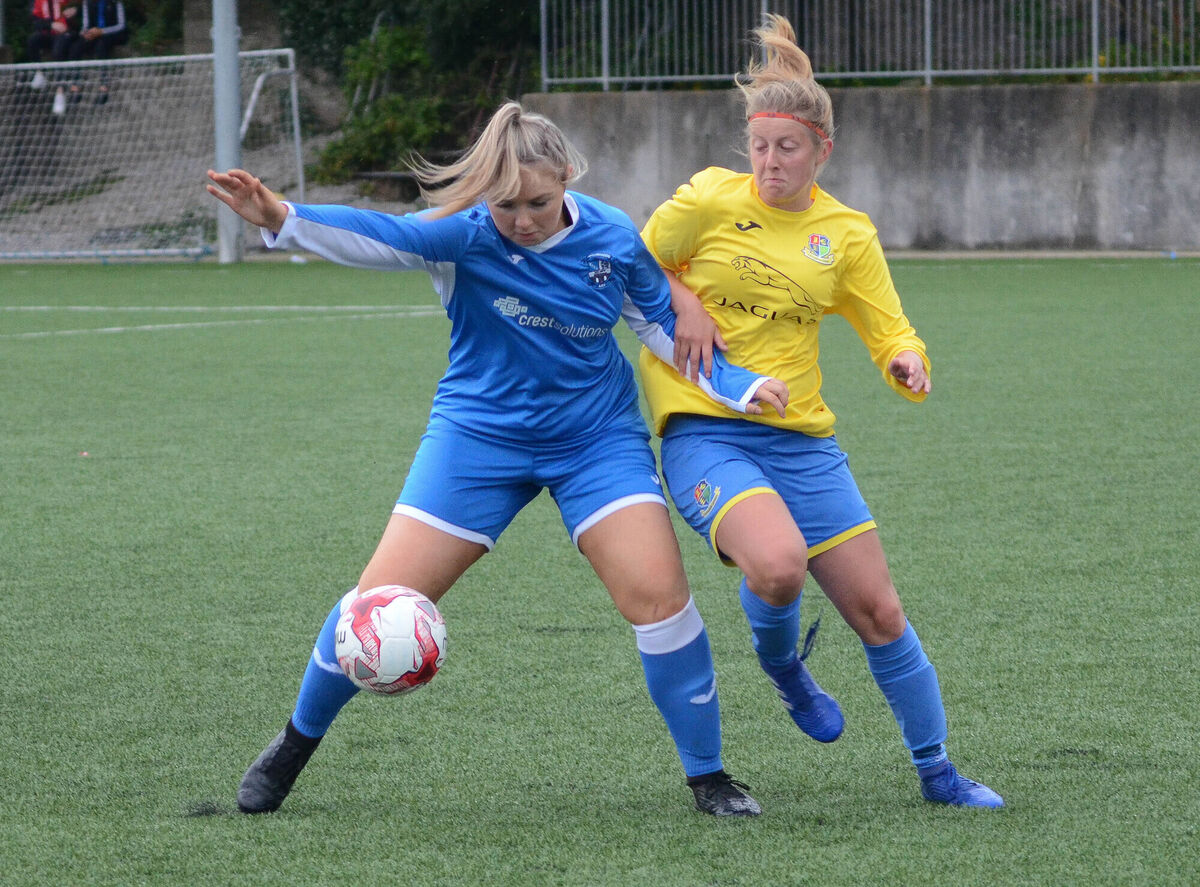 Ballinhassig's Sophie Hurley keeps Carrigaline's Rebekah Grant away from the ball during the CWSSL GE Healthcare Senior Ladies Division 1 game at Ballea Park. Picture: Howard Crowdy