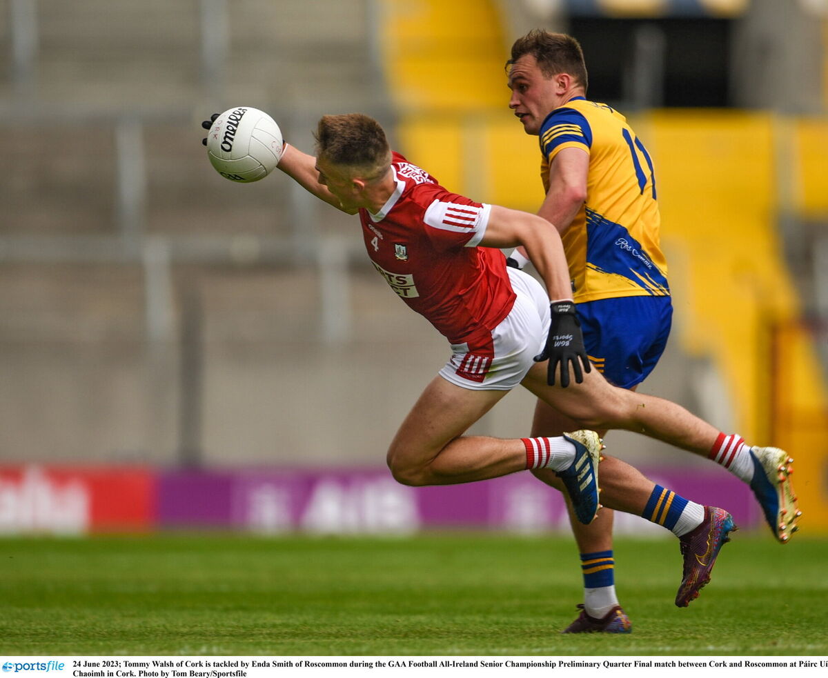 Tommy Walsh of Cork is tackled by Enda Smith of Roscommon during the GAA Football All-Ireland Senior Championship Preliminary Quarter Final match between Cork and Roscommon at Páirc Uí Chaoimh in Cork. Photo by Tom Beary/Sportsfile