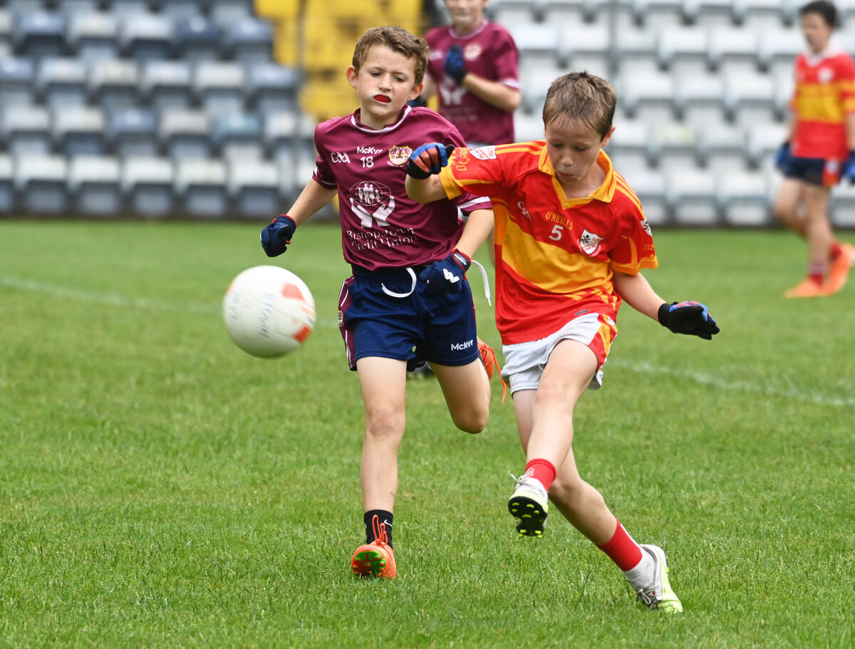Éire Óg's Aaron Murphy clears from Bishopstown's Jack Duggan. Picture: Eddie O'Hare Éire Óg's Aaron Murphy clears from Bishopstown's Jack Duggan. Picture: Eddie O'Hare