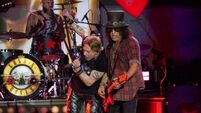 Guns N’ Roses triumph with Glastonbury debut as Lana Del Rey has power cut off