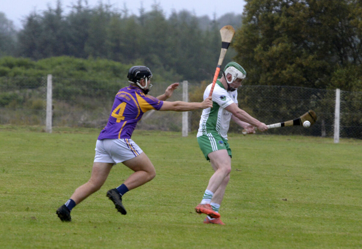 Divisional GAA: Muskerry v Carbery in Castletownkennigh: Carbery Rangers James Moloney blocks the shot of Muskerry's Tadgh O'Connell. Picture Denis Boyle Divisional GAA: Muskerry v Carbery in Castletownkennigh: Carbery Rangers James Moloney blocks the shot of Muskerry's Tadgh O'Connell. Picture Denis Boyle
