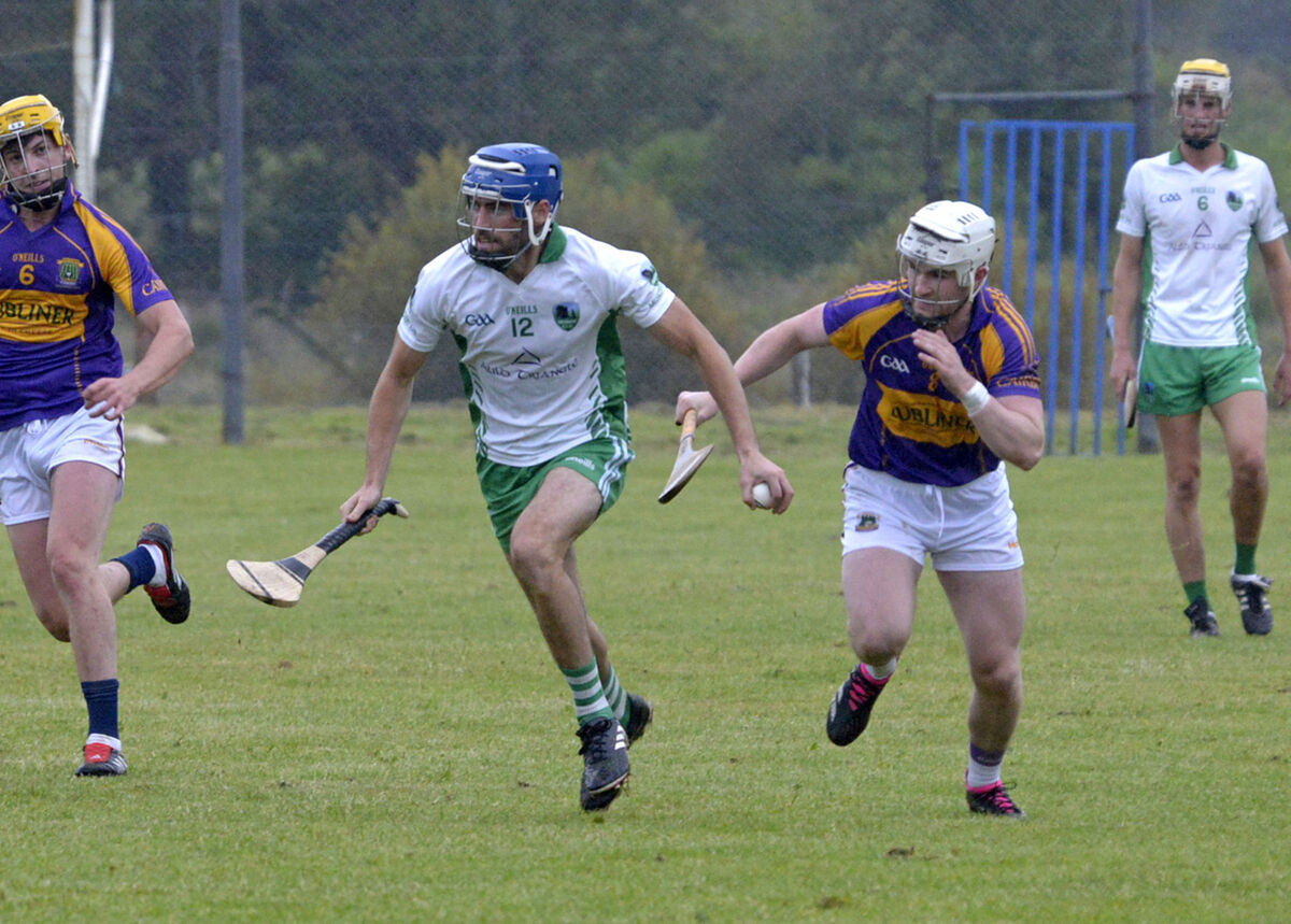 Divisional GAA: Muskerry v Carbery in Castletownkennigh: Carbery Rangers Bertie Butler chases Muskerry's Seamus Cronin. Picture Denis Boyle Divisional GAA: Muskerry v Carbery in Castletownkennigh: Carbery Rangers Bertie Butler chases Muskerry's Seamus Cronin. Picture Denis Boyle