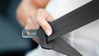 Hand pulling seat belt