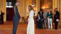 Derek Draper watches as wife Kate Garraway collects MBE from William