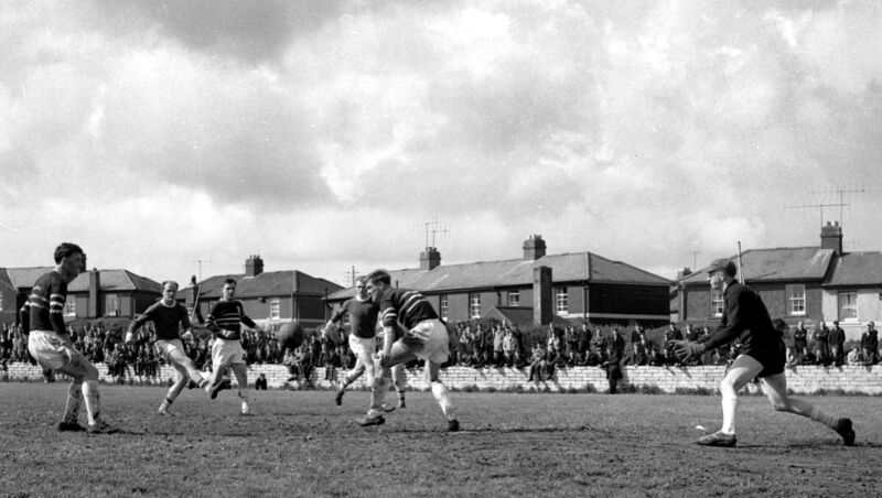 Cork Celtic v Cork Hibernians action in 1965 at Turner's Cross, including Celtic players Pat O'Mahony, Johnny Clifford and Ray Cowhie.