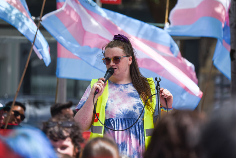 Saoirse Mackin, organiser of the Trans+ Pride Cork march, speaks to those in attendance on Saturday. Picture: Cian O'Regan.