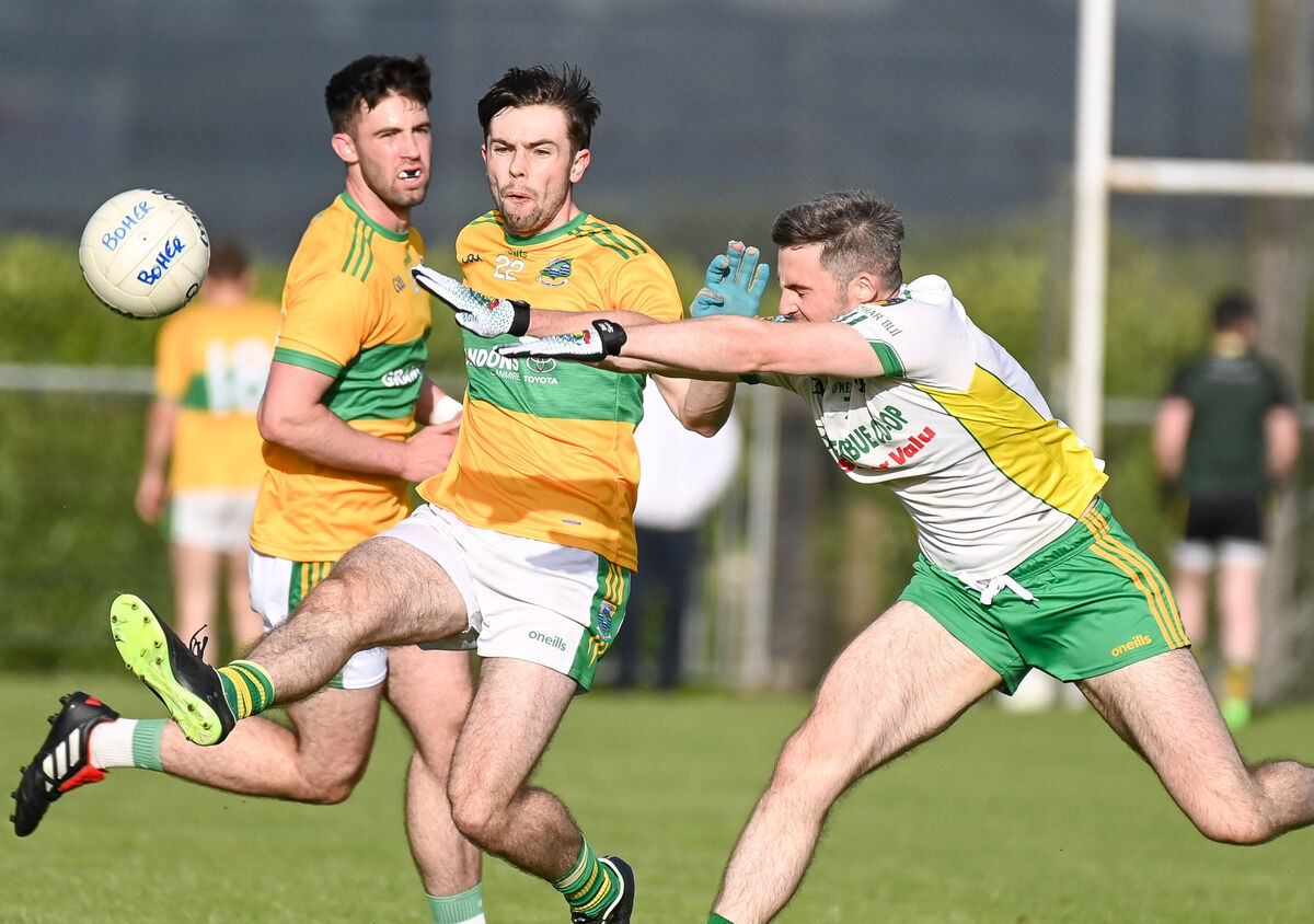  Glanmire's Tommy Lonergan shoots under pressure from Boherbue's Denis O'Sullivan, during their Cork Credit Unions FL Division 5 final at Donoughmore. Picture: David Keane.