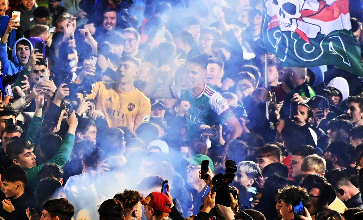 Cork City's David Harrington and Cian Coleman celebrate with supporters after promotion. Picture: Eddie O'Hare