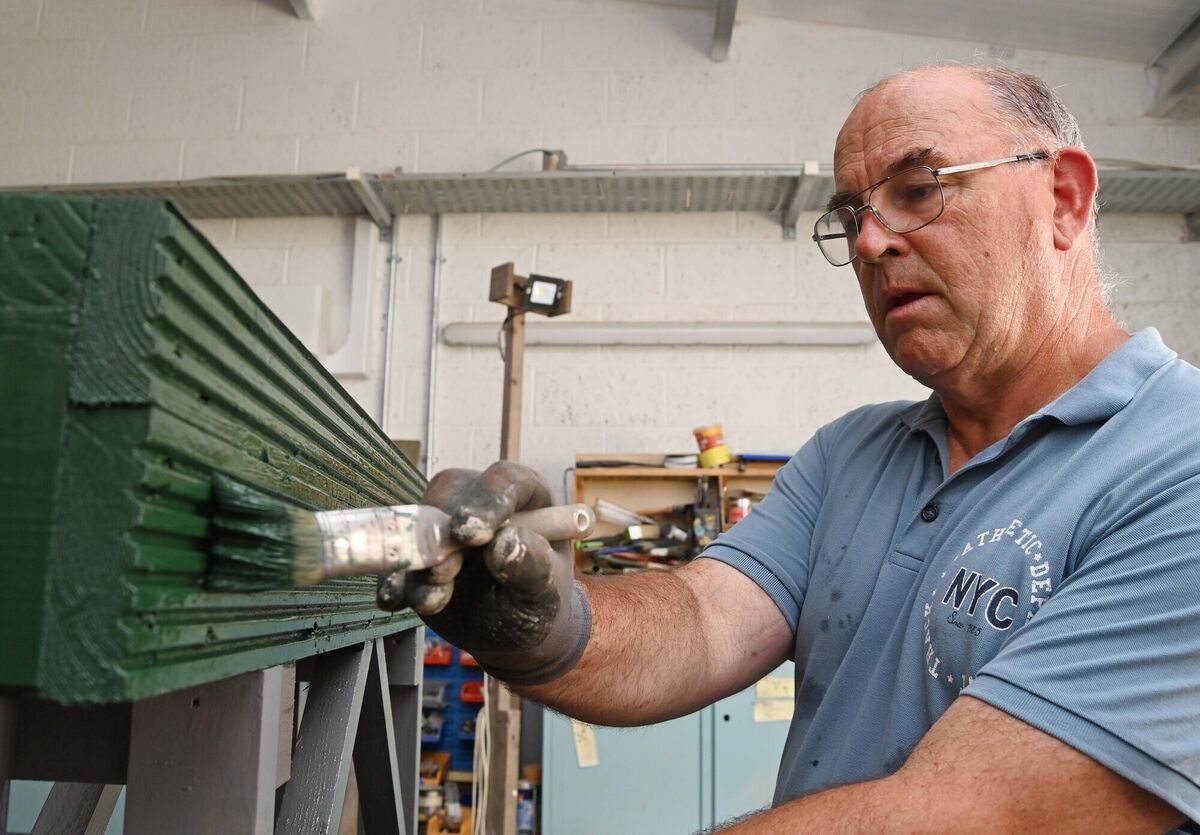 Finbarr Heas painting in the woodwork room in Carrigaline Men's Shed. Picture: Denis Minihane