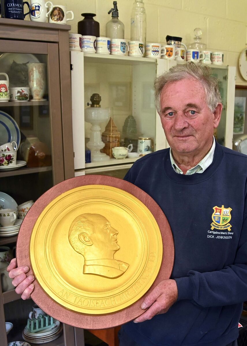 Dick Jenkinson, vice-chairman, with a restored plaque featuring Jack Lynch at Carrigaline Men's Shed. Picture Denis Minihane.