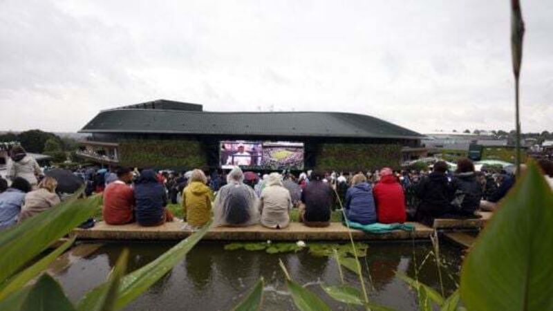 All play stopped on Wimbledon outside courts after consistent rain on day two