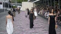 Paris Fashion Week continues to draw stars in riot-hit France