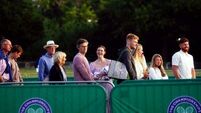 Wimbledon fans hoping for fewer showers after rain-hit second day