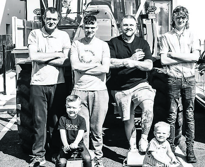 Gerard Wright, Daniel Wright, Gavin Wright and Timmy Wright. Pictured with Amy and Daniel’s sons Liam and Oisin Wright.