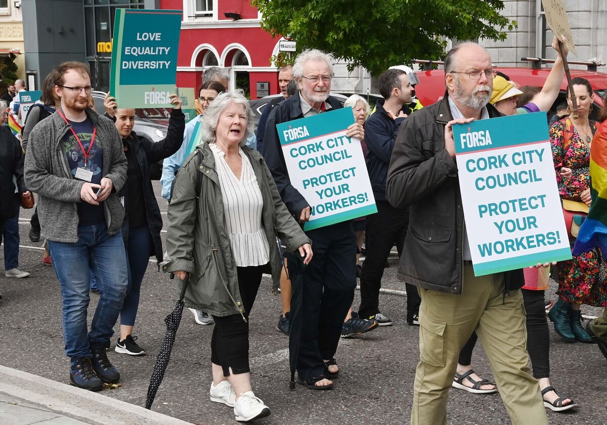 The FÓRSA solidarity rally in support of Cork City Library staff making its way to Cork City Hall. The FÓRSA solidarity rally in support of Cork City Library staff making its way to Cork City Hall.