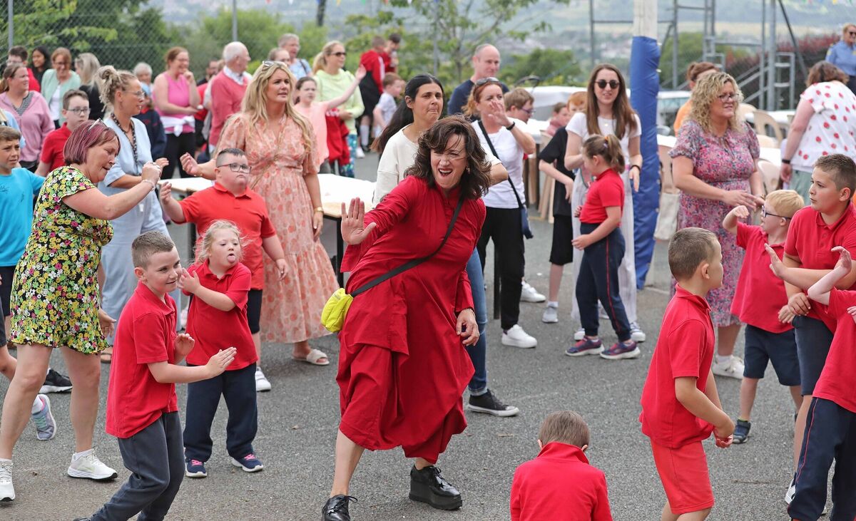Maria Doyle Kennedy, enjoys the music and dancing with the pupils, teachers and parents at the school. Picture: Jim Coughlan. Maria Doyle Kennedy, enjoys the music and dancing with the pupils, teachers and parents at the school. Picture: Jim Coughlan.