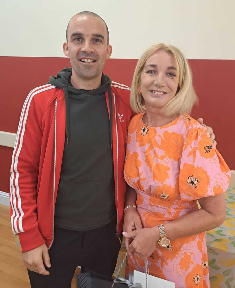Niall Collins, Foroige Mayfield, makes presentation to Garda Helen Courtney, Community Policing Mayfield, to mark her retirement. Pic: Derek Connolly Niall Collins, Foroige Mayfield, makes presentation to Garda Helen Courtney, Community Policing Mayfield, to mark her retirement. Pic: Derek Connolly