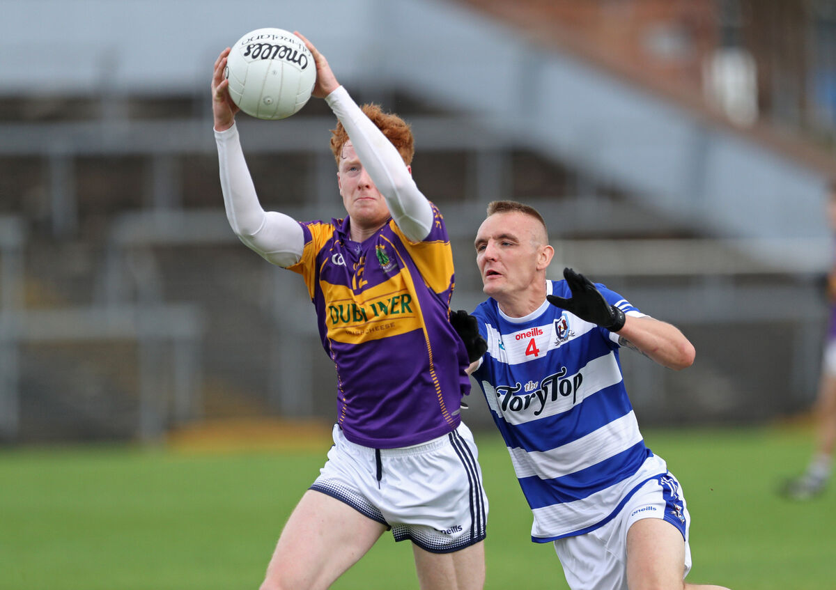  Jamie O'Brien, Ballyphehane, closes in on Padraig Healy, St Oliver Plunkett's. Picture: Jim Coughlan