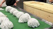 Reburial ceremony held as 400-year-old human skulls returned to Inishbofin