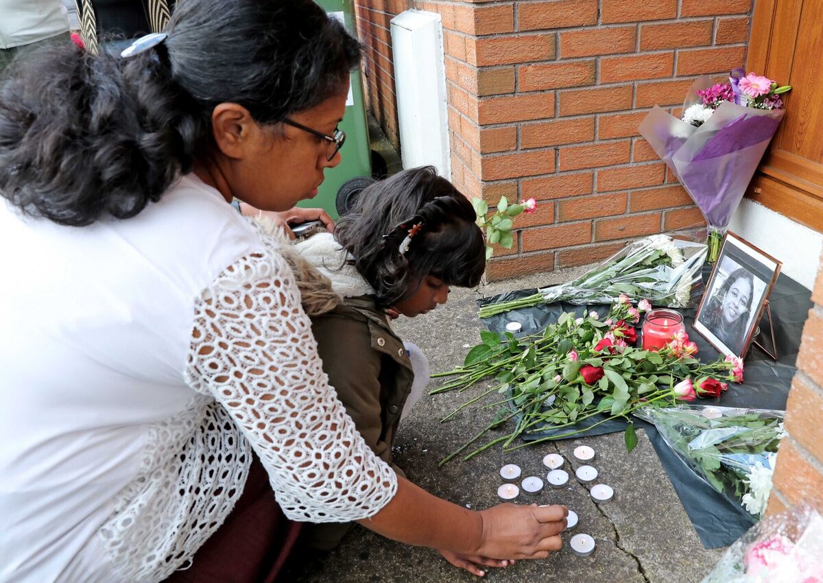 Members of the Cork Indian community light candles at the home of the late Deepa Dinamani. Members of the Cork Indian community light candles at the home of the late Deepa Dinamani.