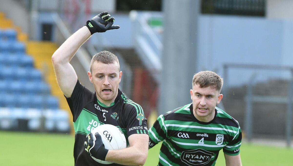 Conor Horgan, Nemo Rangers takes the mark against corner back Luke McGrath, Douglas. Conor Horgan, Nemo Rangers takes the mark against corner back Luke McGrath, Douglas.