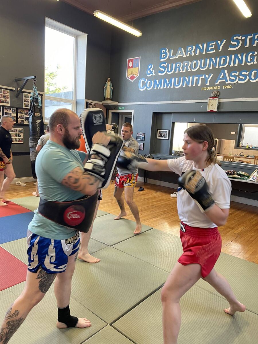 Gold medal winner Aideen Mullins working on the pads with Dommie Kelly at the Siam Warriors Gym. Gold medal winner Aideen Mullins working on the pads with Dommie Kelly at the Siam Warriors Gym.