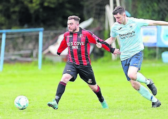 Avondale’s Simon Falvey challenges Ringmahon’s Evan Galvin during their league game in April last year. Falvey has returned to the Dales after a season with UCC.  	Picture: Jim Coughlan
                    