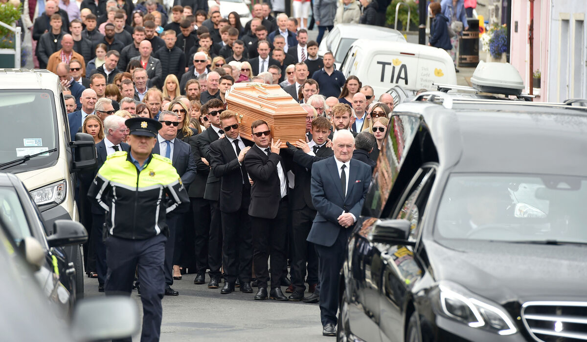 The coffin of Ciaran Keating is carried towards St Patrick's Church in Louisburgh, Co Mayo, for his funeral. Pic: Oliver McVeigh/PA Wire