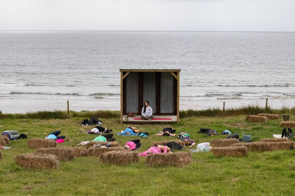 A yoa class on Ballybrannigan Beach in East Cork, beside Niamh's Larder. Picture: Richard Gordon A yoa class on Ballybrannigan Beach in East Cork, beside Niamh's Larder. Picture: Richard Gordon