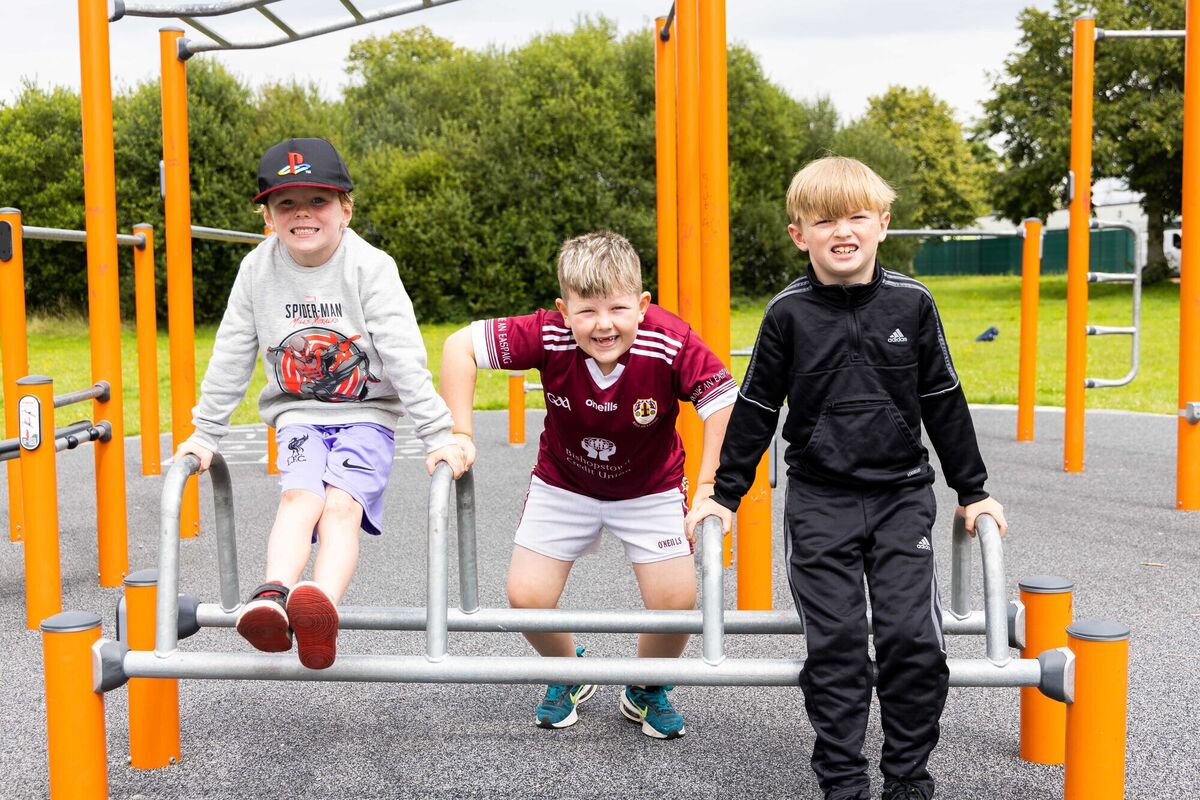 Evan O'Flynn, Curraheen; Sean Young, Bishopstown, and John Faulkner, Bishopstown, pictured using the new outdoor gym installed in Murphy’s Farm.