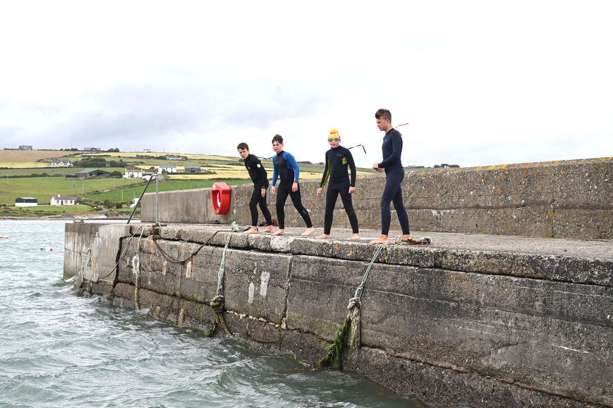 (l to r) Tiernan White, Sean Collins, Adam Coholan and Matthew Coholan, jump off the pier. They took part in the Irish Water Safety summer week programme, run by Cork Water Safety at Garrylucas, Garretstown Co Cork. Pic Larry Cummins (l to r) Tiernan White, Sean Collins, Adam Coholan and Matthew Coholan, jump off the pier. They took part in the Irish Water Safety summer week programme, run by Cork Water Safety at Garrylucas, Garretstown Co Cork. Pic Larry Cummins