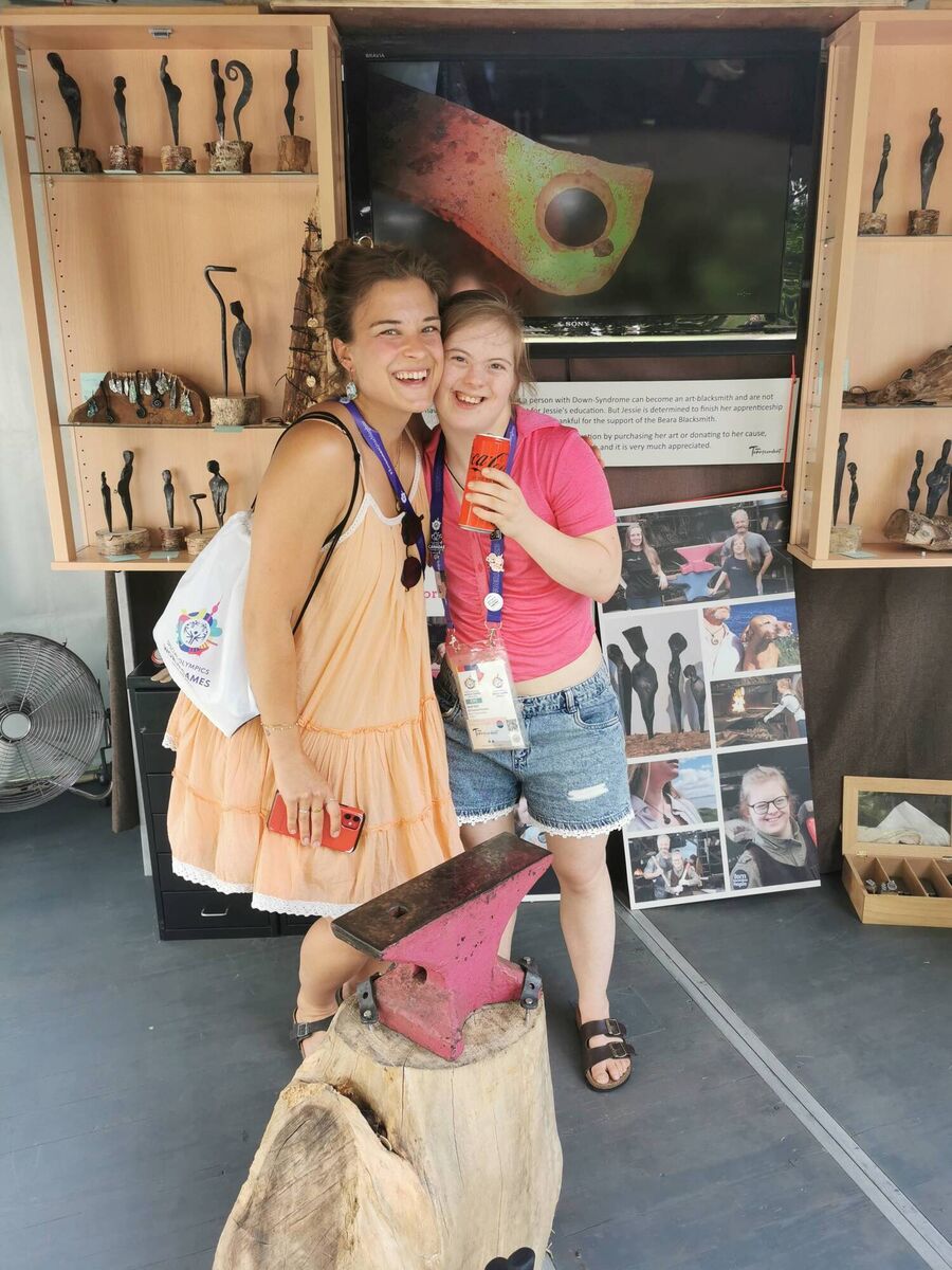 Jessie Waschkowitz from Castletownbere poses with a customer who bought earrings at her stall which was showcased at the 2023 Special Olympics World Summer Games