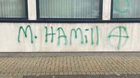Threatening graffiti with judge’s name appears on court building
